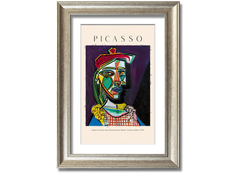 A vibrant reproduction of Picasso's 'Woman In Beret And Checked Dress 1937' printed on canvas, framed and ready to hang.